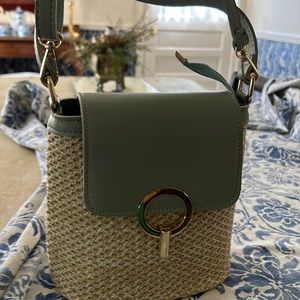 Straw handbag with shoulder straps